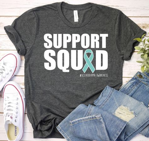 Support Squad Shirt- Scleroderma Awareness Shirt, Teal Ribbon Scleroderma Shirt, Scleroderma Awareness Week Shirt, Scleroderma Support Shirt(F16P358) ------------------------------------------------------- A B O U T - T H I S - T S H I R T ------------------------------------------------------- Scleroderma Awareness gifts for Scleroderma supporters Shirts. Great gift for Scleroderma fighter and Scleroderma warrior. Funny rainbow shirt for girls, men or anyone who supports Scleroderma Available in size : XS, S, M, L, XL, 2XL, 3XL Available in color  * Black * White * Brown * Dark Grey Heather * Red * Heather Kelly * Heather True Royal * Heather Olive * Red * Heather Navy ------------------------------------------------------- F A B R I C A T I O N ------------------------------------------- Lime Green Ribbon, Recovery Shirts, Teal Ribbon, Warriors Shirt, Ribbon Shirt, Warriors T Shirt, Rainbow Shirt, Wear Green, Awareness Shirt