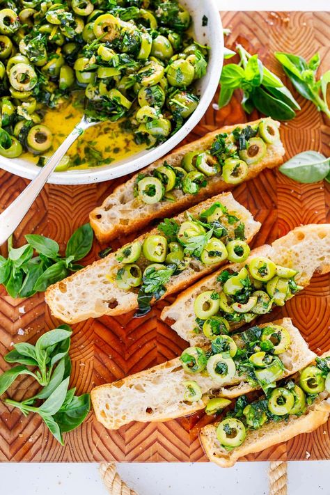 This green olive tapenade is made with buttery Castelvetrano olives, loads of fresh herbs, lemon zest, garlic, and Aleppo chili flakes bathed in extra virgin olive oil. Your focaccia bread will thank you. Best Focaccia Bread, Best Focaccia, Green Olive Tapenade, Castelvetrano Olives, Focaccia Bread Recipe, Olive Recipes, Olive Tapenade, Focaccia Bread, Chili Flakes