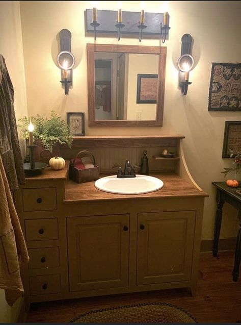 A bathroom vanity with character, crafted in a primitive style. Modern conveniences mixed with old world charm. Primitive Bathroom Ideas, Gail Reeder, Colonial Bathroom, Primitive Bathroom Decor, Country Bathrooms, Primitive Cabin, Primitive Bathroom, Country Bathroom Decor, Rooster Kitchen Decor