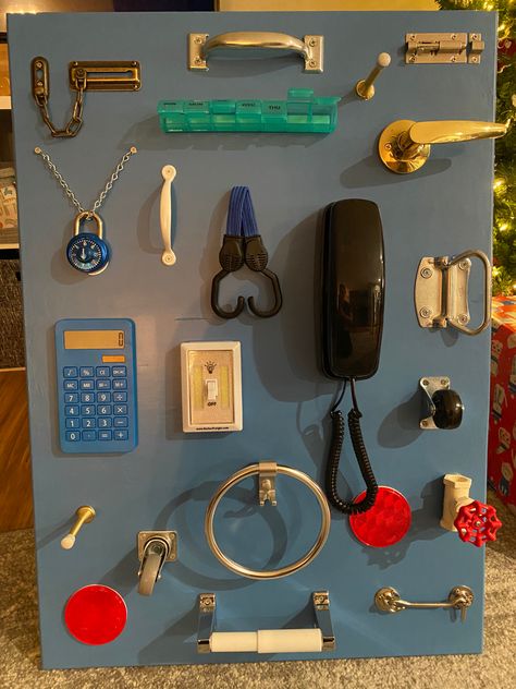 Homemade Toddler Busy Board with supplies from Menards, Amazon, & around the house. Lock And Key Busy Board, Busy Boards Diy, Toddler Busy Board Diy, Homemade Busy Board, Diy Busy Board Toddler, Diy Busy Board, Toddler Busy Board, Toddler Activity Board, Busy Board Baby