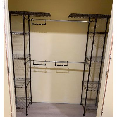 Five shelves per tower with plastic shelving liners included Two towers with extendable clothing racks to custom-fit your closet Winston Porter Color: Bronze | Winston Porter Forontenac Steel Armoire 72.0 H x 80.0 W x 14.0 D in brownMetal in Bronze | 72" H X 80" W X 14" D | Wayfair Closet Organizers For Small Closets, Small Clothes Closet Organization, Closet Redesign, Shelves Brown, Small Closet Storage, Rack Wardrobe, Small Closet Organization Bedroom, Closet Transformation, Maximize Closet Space