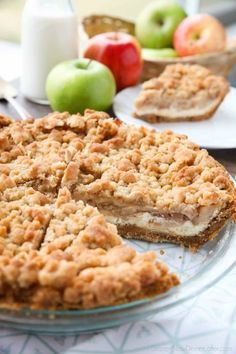 Apple Streusel Cheesecake Pie combines two dessert favorites with a graham cracker crust, creamy cheesecake layer, homemade apple pie filling, and crunchy streusel topping. Apple Pie With Graham Cracker Crust, Cream Cheese Apple Pie Recipe, Apple Streusel Cheesecake, Pie Filling Desserts, Dessert Favorites, Apple Cream Cheese, Graham Cracker Recipes, Cheesecake Layer, Homemade Graham Cracker Crust