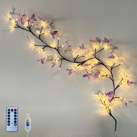 PRICES MAY VARY. The wall decor vine lights are 5.6 ft long with 48LED, you can place the vine wherever you need it keep it connected to power source. Create your own romantic and unique look for your space. All branches, stems and twigs are flexible and sturdy, Iron twig branch wires easy to shape into different shapes to fit your decorating needs. Quality material: our festive lighted garland adopts copper wire, bendable and sturdy, the bulb is taken from glass material, compact and energy-sav Forest Room Ideas, Vines With Lights, Forest Room Decor, Butterfly Vine, Vine Lights, Green Sofa Living, Butterfly Room Decor, Forest Room, Glowing Flowers