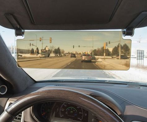 Pull down the see through sun visor and keep the sun out of your eyes and face while avoiding possible blind spots. This handy device installs in seconds without tools and provides some much needed relief from the sun's unrelenting rays. Tinted Windows Car, What Is Design, Car Visor, Hammacher Schlemmer, Car Buying Tips, Tesla Car, Car Gadgets, Tinted Windows, Colour Tint