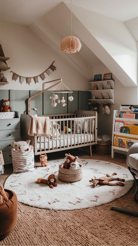 Discover the latest trends in nursery room design and turn your little one's space into a cozy sanctuary. From whimsical wallpaper to functional storage solutions, find inspiration to create a dreamy nursery that both you and your baby will love. Whether you're going for a classic, modern, or gender-neutral theme, explore ideas for furniture arrangements, color palettes, and decor accents. Transform any nursery into a stylish and inviting room where precious moments are cherished and memories ar Gray Crib Nursery Color Schemes, Gender Neutral Baby Rooms, Little Explorer Nursery, Sage Baby Room, Whimsical Nursery Room Inspiration, World Nursery Theme, Baby Room Themes Neutral, Grey Crib Nursery, Nursery Room Design Ideas