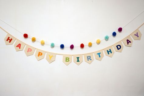 "🌈✨ Make Your Party Pop with Our Rainbow \"HAPPY BIRTHDAY\" Fabric Bunting! ✨🎉 Give your birthday celebration a personal touch with our hand-made \"HAPPY BIRTHDAY\" fabric bunting! Created with care, this bunting adds a splash of fun and individuality to your special day. Designed to withstand the test of time, our fabric bunting is not only stylish but also durable so you can use year after year.  🌟 Rainbow Vibes: Our linen-coloured flags are adorned with rainbow-coloured felt letters, creating a cheerful visual display. The 12.5cm x 10.5cm flags are the perfect size to make a statement without overpowering your space. 🧵 Quality Craftsmanship: Each flag is securely stitched onto cream-coloured bias binding tape, making sure it stays put. This means your \"HAPPY BIRTHDAY\" bunting will Eco Friendly Party, Rainbow Happy Birthday, Birthday Fabric, Mantle Decorations, Felt Bunting, Happy Birthday Bunting, Birthday Cheers, Felt Banner, Birthday Bunting