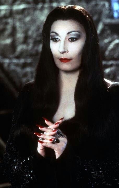 Anjelica Huston. Here as Morticia Addams on The Addams Family. Costume designed by Ruth Myers. Morticia Addams Quotes, Charles Addams, Gomez And Morticia, Yvonne De Carlo, Anjelica Huston, Morticia Addams, Adams Family, Family Costumes, Halloween Hair