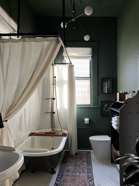 The Green Bathroom Makeover - Renee Renovates Dark Green Bathroom Ceiling, Green Bathroom Ceiling, Green Ceiling Bathroom, Dark Green Small Bathroom, Black And Green Bathroom Ideas, Green Moody Bathroom, Dark Moody Bathroom Ideas, Dark Green Bathroom, Log Cabin Bathroom