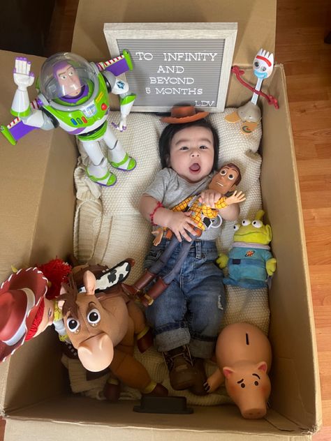 Toy story theme ideas Toy Story Milestone Picture, Toy Story Monthly Photo, Toy Story Baby Photoshoot, Themed Monthly Baby Pictures, Toy Story Baby Announcement, Toy Story Photo Shoot Ideas, Baby 2024, 5 Month Old Baby, Toy Story Baby