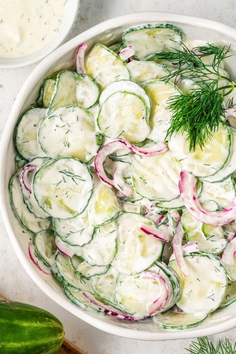 Creamy Cucumber Salad! Ultra velvety with just the right amount of tartness, this creamy cucumber salad is a mix of English cucumbers, red onions, and a rich, flavorful dressing. | HomemadeHooplah.com Cucumber Tomato And Red Onion Salad, English Cucumber Salad Recipe, English Cucumber Salad, Cucumber Salad Dressing, German Cucumber Salad, Cucumber Canning, Creamy Cucumber Salad, Creamy Cucumbers, Red Onion Salad