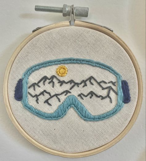 3” embroidery of mountains in the frame of snow goggles Ski Embroidery Design, Unique Embroidery Patterns, Embroidery Designs Mountains, Mountain Embroidery Designs, Snowboard Embroidery, Embroidery Mountains Simple, Skiing Embroidery, Masculine Embroidery, Colorado Embroidery