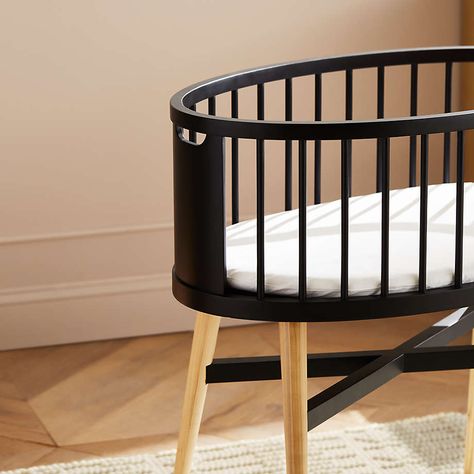 Orland Black Bedside Baby Bassinet & Pad + Reviews | Crate & Kids Black Bassinet, Black Spindles, Baby Basinets, Wood Bassinet, White Bassinet, Modern Bassinet, Baby Cabinet, Oval Crib, Sleeping Babies