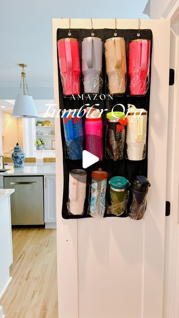 Arin Jura | Amazon Finds + Organization + DIY & Decor on Instagram: "Rory was a paid actor while supervising this organization project.  3 ways to organize tumblers and water bottles before the school year starts. All great pending your space and needs! 🐶

Comment TUMBLER ORGANIZATION for the links or 

You can always find my links at the link in my bio on my AMZ storefront under the Kitchen Organization list . 

Or go here: https://amzlink.to/az00VfOORO9Kp 
.
.
.
.
.
#tumblerorganization #cabinetorganization #spacesavingorganization #spacesaving #organize #organizewithme #homeorganization #amazonhome #amazonhomefinds #amazonfinds #amazonfinds2024 #amazonfind #amazonhomefind #amazonmusthaves #amazonmusthave #amazonfavorites #amazonfavorite #kitchenorganization  #kitchenorganizer #organiza Tumbler Organization, Bedroom 2024, Organization Lists, Organizing Hacks, Ways To Organize, Organization Diy, Cabinet Organization, Amazon Home, Diy Organization