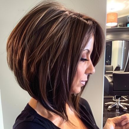 Voluminous Angled Bob with Layered Crown Stacked Bob Haircut With Layers, Long Inverted Bob Hairstyles With Layers, Angled Bob Haircuts Brunette, Inverted Angled Bob, Brown Angled Bob, Short Angled Bob With Curtain Bangs, Choppy Layered Bob Hairstyles Medium, Stacked Brunette Bob, Angeles Bob Haircut