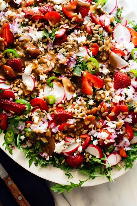 This strawberry salad is colorful and delicious! It's made with arugula, strawberries, goat cheese, sunflower seeds and balsamic vinaigrette. Strawberry Goat Cheese Salad, Strawberry Arugula Salad, Strawberry Goat Cheese, Salad With Balsamic Vinaigrette, Homemade Balsamic Vinaigrette, Arugula Salad Recipes, Salads For A Crowd, Big Salad, Strawberry Salad