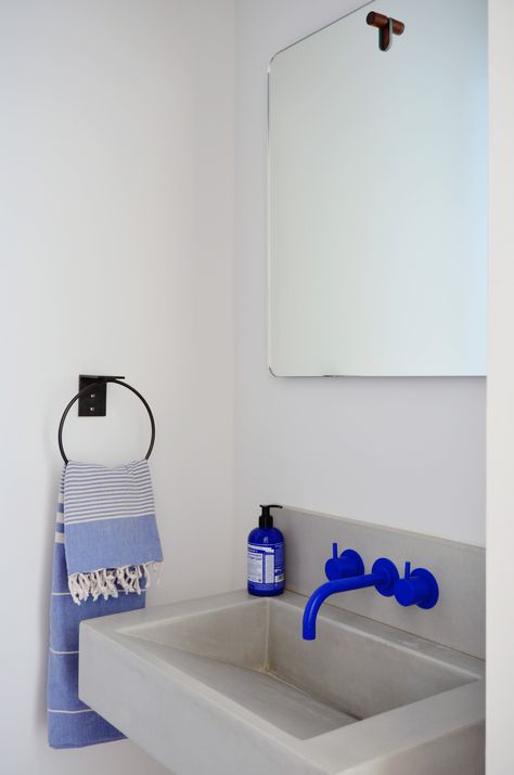 A bright cobalt blue Vola faucet provides a splash of color in the powder room. Vola Faucet, Dekorere Bad, Interior Design Color, Blue Bathroom, Home Remodel, Cheap Decor, Cheap Home Decor, Bathroom Faucets, Bathroom Inspiration