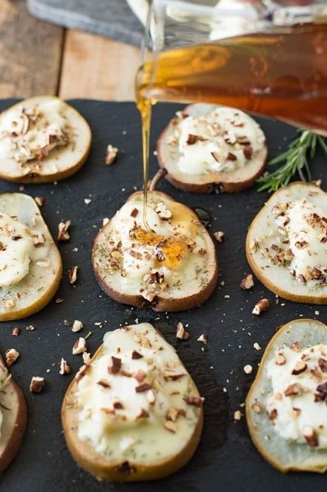 Baked pears are filled with creamy, tangy Chevrot French goat cheese, topped with sweet honey, sprigs of fresh rosemary and pecans for an easy snack or elegant appetizer. Food Dinners, Baked Pears, Elegant Appetizers, Think Food, Rigatoni, Goat Cheese, Clean Eating Snacks, Easy Snacks, Appetizer Snacks