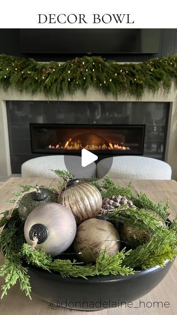 Donna Delaine Dyck / Home decor & design on Instagram: "My new favourite ornaments ✨ In a holiday decor bowl…a simple and beautiful statement! I think these ornaments are so gorgeous! The rustic glam collection from pottery barn has a vintagey look..with soft muted tones. Perfect for my neutral loving heart🤎 I love a pretty decor bowl ..for a coffee table, dining table, console..✨ Comment ‘shop’ for links! Details✨ Large bowl Cedar garland Fairy lights (the green wire ones are nearly invisible here) 2 large pinecones and 5 ornaments" Bowl With Ornaments, Bowl Of Ornaments Centerpieces, What To Put In Bowls For Decoration, Holiday Bowl Decor, Christmas Orbs Decorating Ideas, Console Table Decorating Christmas, Christmas Centerpieces For Coffee Table, Ornaments In Bowl, Large Bowl Decor Ideas