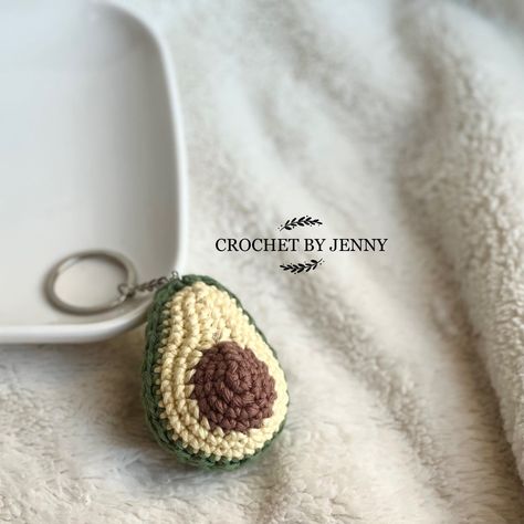 Avocado Keychains are handmade crochet plushies that make cute and unique accessories. They are perfect for🥑 lovers of all.#crochetkeychain #handmadegifts #DIYkeychain #crochetlove #keychainaddict Crochet Avocado Keychain, Cute Crochet Charms, Cute Keychain Crochet, Knitting Keychain, Avocado Crochet, Crochet Avocado, Avocado Keychain, Crochet Charms, Cute Keychains