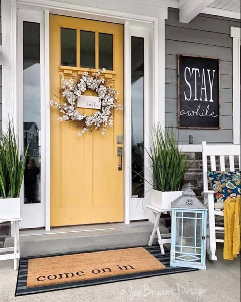 30 Gorgeous And Inviting Farmhouse Style Porch Decorating Ideas Yellow Front Door, Glass Railings, Yellow Door, Farmhouse Front Door, Doors Exterior, Winter Porch, Farmhouse Front Porches, Yellow Doors, Farmhouse Porch