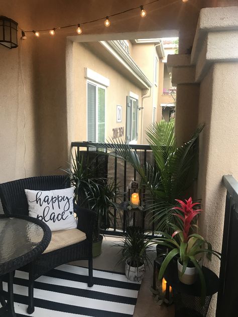 Patio Lights Apartment, Plants On Small Patio, Tiny Patio Decor, Black And White Balcony Decor, Apartment Small Balcony Decorating, Apt Patio Ideas, Apartment Front Porch Ideas, Small Patio Ideas Apartment, Tiny Patio Ideas