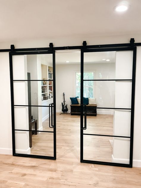 Glass Door Room Separator, Transparent Barn Door, Glass Interior Barn Doors, Glass Doors With Black Frame, Glass Sliding Interior Doors, Glass Barn Door Kitchen, Sliding Modern Door, Industrial Glass Doors Interior, Barn Doors In The House Office