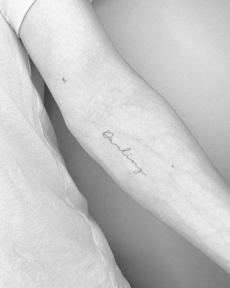 Forearm Letter Tattoo Women, Darling Cursive Tattoo, Forearm Handwriting Tattoo, Tattoo Inner Forearm Woman, Darling Tattoo Words Fonts, Fine Line Script Tattoo Forearm, Letter Tattoo Placement Ideas, Angel Energy Tattoo Cursive, Forearm Word Tattoo Women