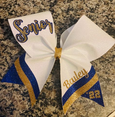 Custom cheer bow in full glitter  rainbow white with accent colors. Senior is standard wording but can be changed to any text.  Primary color is ribbon color Cheer Ribbon, Competition Bows, Custom Cheer Bows, Cricut Projects Easy, Glitter Cheer Bow, Cheerleading Bows, Cheer Poses, Cheer Hair, Glitter Heat Transfer Vinyl