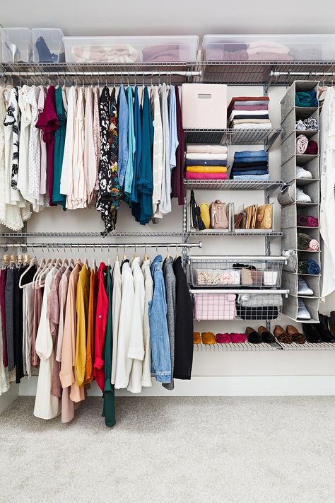 This space implements several smart walk-in closet organization ideas: hanging bars, cubby storage, and drawers help organize clothing. #organization #closetorganization #closetideas #bhg Organizing Walk In Closet, How To Organize Your Closet, Best Closet Organization, Closet Clothes Storage, Closet Clutter, Organized Closet, Small Closet Space, Walking Closet, Closet Hacks Organizing