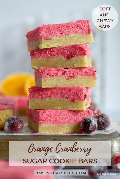 These orange cranberry sugar cookie bars are a great addition to holiday cookie trays! The soft and chewy orange sugar cookie bars are frosted with an easy cranberry buttercream. It's a popular favorite for the Christmas season! ~ Recipe on twosugarbugs.com #orangecranberry #sugarcookiebars #cranberrybuttercream Cranberry Buttercream, Cranberry Butter, Cranberry Orange Cookies, Bar Desserts, Winter Baking, Cranberry Cream Cheese, Sugar Cookie Mix, Orange Cranberry, Chewy Sugar Cookies