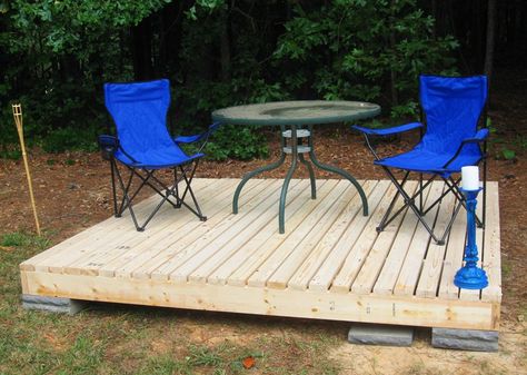 My stepfather needed a deck at his duplex that wasn't permanent, and was relatively cheap. I put this together in a couple of hours for about a hundred dollars. Deck Building Plans, Building A Floating Deck, Simple Deck, Laying Decking, Floating Deck, Wooden Deck, Easy Backyard, Diy Pool, Pallet Garden