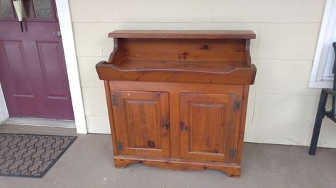 Nothing feels more dated to me than old pine furniture. May be blasphemous to some, but I'd rather paint it and bring it into this century -even though it ended… Old Pine Furniture, Upcycle Storage, Dining Table Makeover, Primitive Bathrooms, Dry Sink, Furniture Movers, Wash Stand, Pine Furniture, Furniture Redo