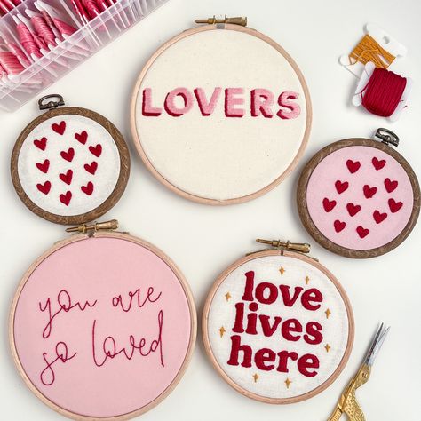 Variety of hand embroidered hoop art on white and pink fabric with love quotes and pink and red hand embroidery thread. Boyfriend and girlfriend gifts. Valentine’s Day Embroidery, Valentines Embroidery Patterns, Valentines Embroidery, Valentines Embroidery Designs, Self Love Art, Embroidery Products, Valentines Collection, Embroidery Hoop Art Diy, Basic Hand Embroidery Stitches