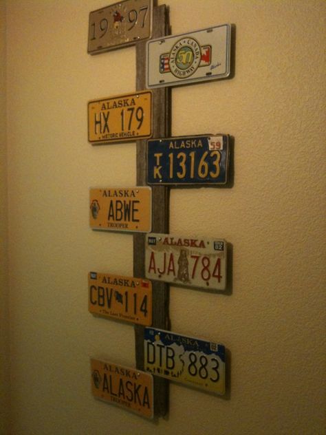 My new creation using Alaska license plates and an old Iowa barn board! How To Display License Plates, Old License Plate Ideas Wall Art, Old License Plate Ideas, License Plate Wall Decor, License Plate Ideas, License Plate Decor, License Plate Wall, License Plate Crafts, Small Bathroom Decorating Ideas