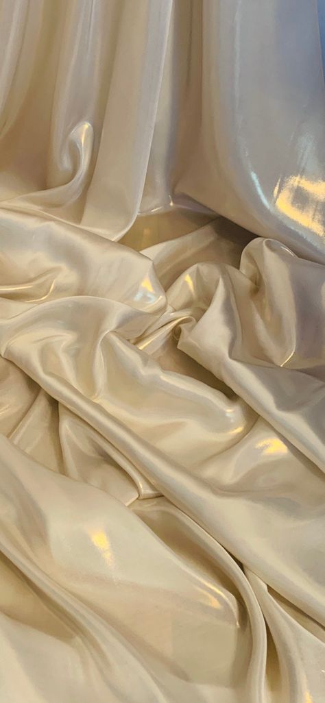 Our shimmer satin has a superior drape like no other. This luxurious fabric has a soft touch and glows beautifully creating a perfect blend between the shimmer and satin. Perfect for all types of dressmaking, crafting, decorating and various other projects.  *Colours may vary due to different screens.  *Width 58 inches *Synthetic *Machine Washable *If you order more than 1 meter, fabric will come as one continuous length. *Fast Delivery Before you go please check out our other items. We offer co Liquid Gold Aesthetic, Ethereal Elegance, Crushed Velvet Fabric, Gold Color Palettes, Diamond Ice, Beaded Tulle, Gold Aesthetic, Fashion Sketchbook, Luxury Aesthetic