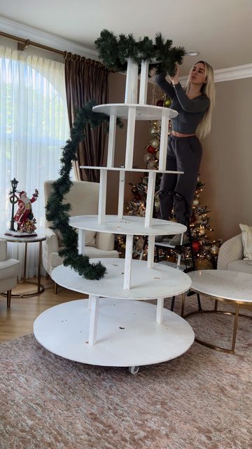 Diy Christmas Village Tree Display, Diy Christmas Village Tree, Christmas Village Tree Diy, Memory Tree Ideas, How To Set Up A Christmas Village, Snow Village Display Ideas, Ways To Display Christmas Village, Christmas Village Tree Display, Christmas Village Display Tree