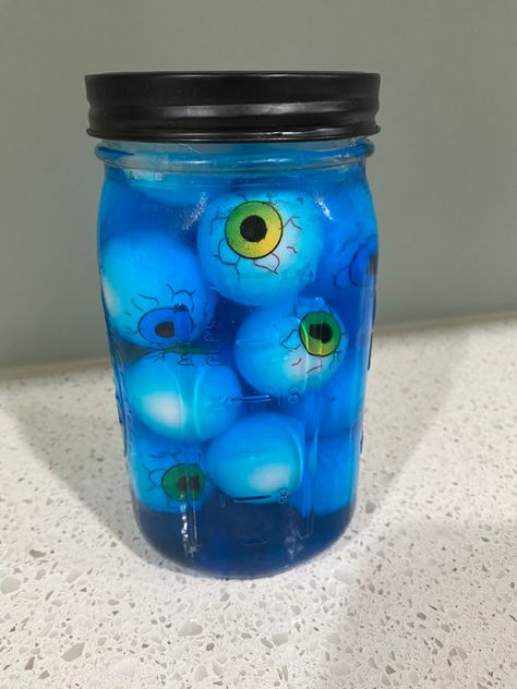 Fill jar half way with Dollar Tree eyeballs, pour dishsoap halfway over top,add more eyeballs to push others down, add lid. Head In Jar Halloween, Water Halloween, Backyard Halloween Party, Lab Decorations, Halloween Run, Halloween Menu, Halloween Things, Eye Ball, Halloween 20