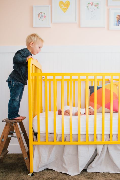 #nursery, #crib, #brothers, #siblings, #yellow  Photography: Samantha Pierson - www.piersonphotocompany.com/  View entire slideshow: Jessica Biel Inspired Nurseries on http://www.stylemepretty.com/collection/1142/ Nursery Yellow, Yellow Crib, Blush Pink Nursery, Style Me Pretty Living, Whimsical Nursery, Yellow Nursery, Pink Nursery, Nursery Inspiration, Baby Boy Rooms