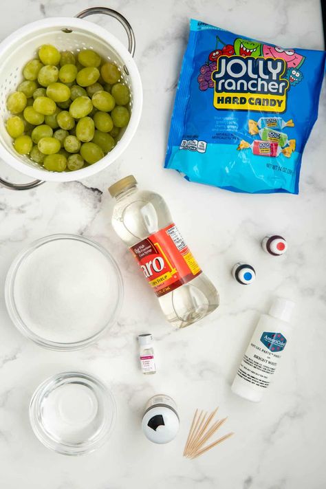 How To Make Frozen Candy Grapes, Recipe For Candy Grapes, How To Make Cotton Candy Grapes, Pink Candy Grapes, How To Make Candied Grapes With Jolly Ranchers, Making Candied Fruit, Candy Covered Fruit Jolly Rancher, Candy Covered Grapes Recipe, Cracked Grapes Recipe