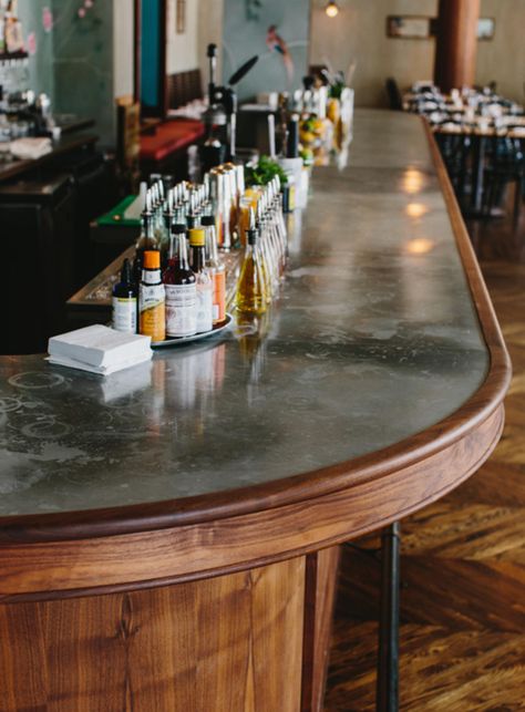 A simple, small space packed with surprising detail. See Skylar Morgan Furniture's work in oiled walnut on the bar and tambour entryway as well as banquettes, back bar shelving and bright, welcoming front doors. Brewery Bar Design, Bar Front Ideas, Restaurant Banquette, Wine Bistro, Bar Tile, Simple Cafe, Brewery Bar, Green Tile Bathroom, Cozy Bar