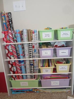 DIY gift wrap station repurposed from an old toy organizer, plus more gift wrap organization ideas {featured on Home Storage Solutions 101} Gift Wrap Station, Planer Organisation, Gift Wrap Organization, Gift Wrapping Station, Gift Wrap Storage, Wrapping Station, Diy Toy Storage, Toy Storage Solutions, Toy Organizer