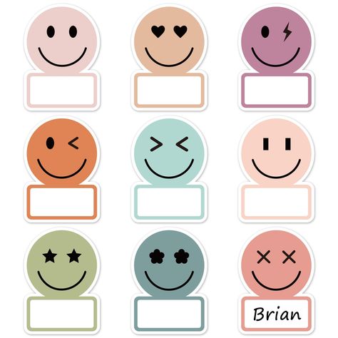 PRICES MAY VARY. Package Includes - 135Pcs name tag stickers in 9 designs, 15pcs of each, they will offer sufficient quantity and rich styles to meet your various needs. Cute & Colorful - Our nameplate stickers are designed as the smile face patterns in 9 different boho colors, cute and fancy, really aesthetic items for various occasions. Premium Material - Our self-adhesive stickers are made of good quality paper and with nice adhesion, sturdy and durable, smooth to write. Enough Writing Space Name Tag Design Aesthetic, Name Tags For Classroom, Desk Wall Decor, Safari Theme Classroom, Bulletin Board Decoration, Cute Classroom, Aesthetic Items, Name Tag For School, Name Tag Design