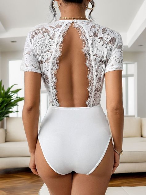 Cutout V-Neck Short Sleeve Lace Bodysuit 🌟 Turn heads in our exquisite Cutout V-Neck Lace Bodysuit! 🌺 Luxuriously soft, 95% polyester, 5% elastane with moderate stretch to hug your curves perfectly. Semi-sheer lace adds a dash of mystery! 😍 Sizes S-XL. Care is a breeze: machine wash cold, tumble low. 🇺🇸 FREE shipping across the US! Snag yours and flaunt your style! 💃 #FashionTrend #LaceLove #FreeShipping https://belongandbe.com/products/cutout-v-neck-short-sleeve-lace-bodysuit Instagram Cutout, Swimsuit Collection, Crop Top Bra, Maxi Dress Cocktail, Swimwear Cover Ups, Maxi Dresses Casual, Swimwear Cover, Lace Bodysuit, Skirted Swimwear