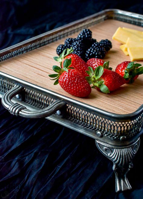 I found these old casserole servers missing their dish at a garage sale. They were so easy to turn into beautiful trays that could be used to organized kitchen counters, a cute nightstand tray, coffee table tray, fruit and cheese tray or serving platter. The possibilities are endless with this easy DIY silver tray makeover! Metal Casserole Holder Repurpose, What To Do With Old Silver Trays, Silver Trays Decor Ideas Kitchen, Silver Serving Tray Decor Ideas, Repurposed Silver Serving Pieces, Silver Platter Decor Ideas, Silver Tray Makeover, Organized Kitchen Counters, Silver Tray Repurpose