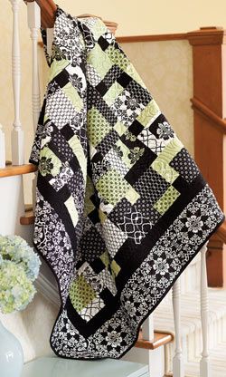 This quilt features nine patch quilt blocks cut into quarters to create a four patch quilt block. Perfect for quilters of all skill levels. Black And White Quilt, Pretty Quilts, 9 Patch Quilt, Black And White Quilts, Quilt Pattern Download, Nine Patch Quilt, Lap Quilts, Pretty Quilt, Missouri Star Quilt