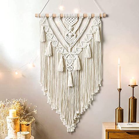 "Add a touch of bohemian elegance to any space with this handcrafted geometric macrame wall hanging. Perfect for bedrooms, living rooms, and nurseries!" Apartment Nursery, Bohemian Crafts, Tassel Crafts, Boho Macrame Wall Hanging, Macrame Wall Hanging Patterns, Boho Room Decor, Woven Tapestry, Macrame Wall Art, Boho Geometric