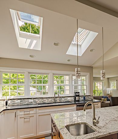 From bathroom decor and kitchen lighting to improved indoor air quality, VELUX skylights transform any space with daylight and fresh air Velux Skylights Kitchen, Kitchen With Skylights, Conservatory Kitchen Ideas, Skylight Living Room, Casas Country, Conservatory Kitchen, Skylight Design, Skylight Kitchen, Velux Skylights