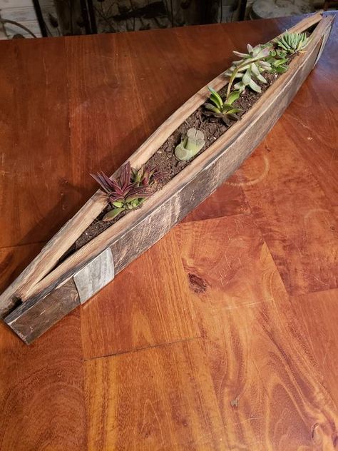 Wine barrel planter made from full length staves (approximately 36").  Planter doesn't not come with plants but works exceptionally well with succulents. Colors of staves may vary from barrels. Approximate size is 36x6x4. Actual sizes may vary depending on staves used.PLEASE NOTE THAT FREE SHIPPING ONLY APPLIES TO WITHIN THE US. If you wish to proceed with the order please send me a message after placing the order and I will give you the shipping cost. Barrel Wood Projects, Wine Barrel Sink Bathroom, Barrel Stave Ideas, Diy Whiskey Barrel, Whiskey Barrel Decor, Wine Barrel Art, Wine Barrel Decor, Wine Barrel Crafts, Wine Barrel Planter