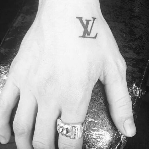 LV tattoo (louis vuitton) Luis Vuitton Tattoo Design, Louis Vuitton Hand Tattoos, Lv Hand Tattoo, Lv Tattoo Louis Vuitton, Lv Tattoo Design, Louis Vuitton Tattoo Ideas, Supreme Tattoo, Lv Tattoo, Chanel Tattoo