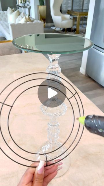 The Bradshaw Residence shared a post on Instagram: "DIY WEDDING CENTERPIECE SERIES✨ ⠀⠀⠀ You guys have been asking me for awhile to give you ideas on Wedding/Party centerpieces. SO THE SERIES CONTINUES TODAY!!!✨ ⠀⠀⠀⠀ How beautiful is this?! I’ve seen several different versions of this on YouTube over the past couple years. I recently saw this done on FB reels and I knew you guys would love this inspo. I don’t know the original content creator who did this. Please feel free to tag them✨ ⠀⠀⠀ ... Diy Centerpieces Engagement Party, 60th Birthday Party Centerpieces Diy, Diy Tall Vase Centerpiece, Party Centerpiece Ideas Diy, Diy Dollar Tree Table Centerpiece, Extravagant Centerpieces, Diy Centerpieces For Dining Table, Diy Birthday Centerpieces, Round Wedding Table Decor